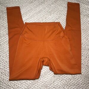 paragon burnt orange leggings
